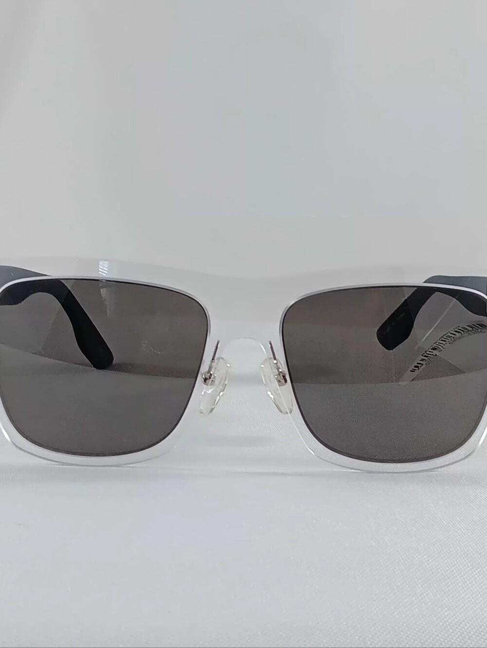 McQ by Alexander McQueen Sunglasses Translucent Black Frames Minimalist Preppy